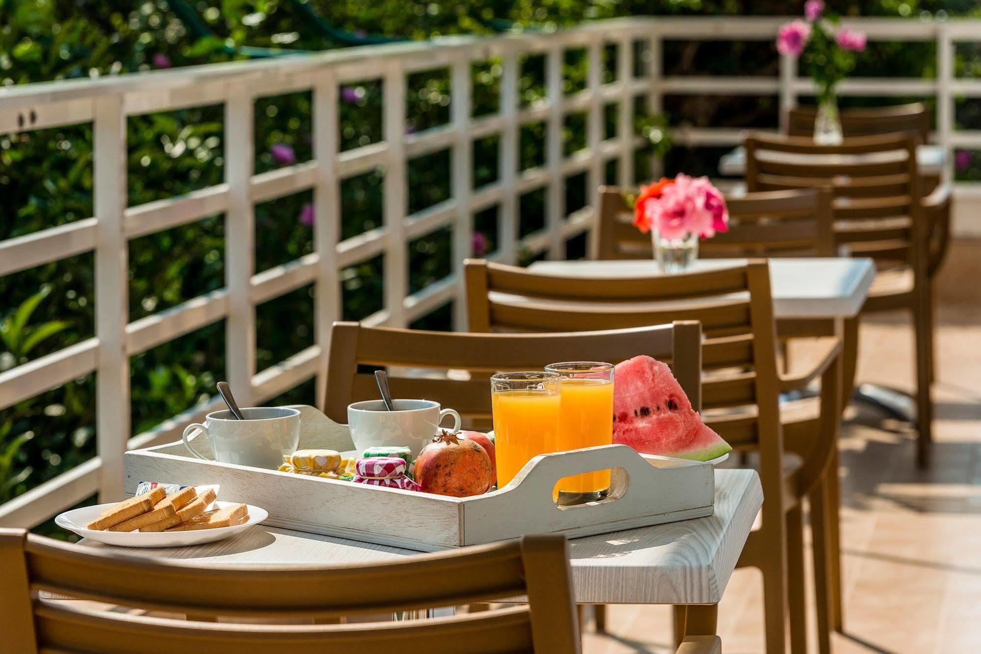 Alpha Stegna Sun Hotel Archangelos  Bagian luar foto